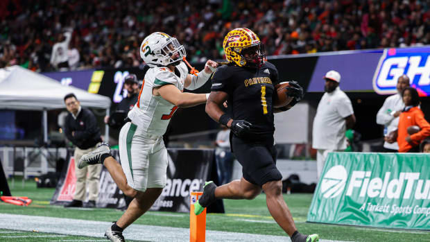 Perry's Ahmad Gordon races into the end zone for a touchdown against Stockbridge in the Georgia 4A state championship game. 12/12/203.